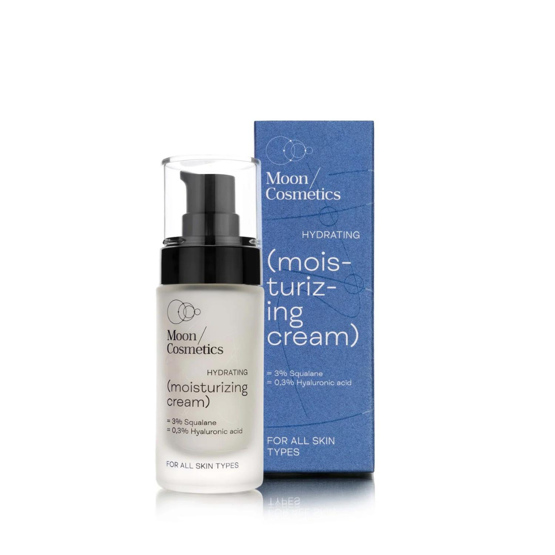 Drėkinamojo kremo buteliukas ir priekinė pakuotės pusė.