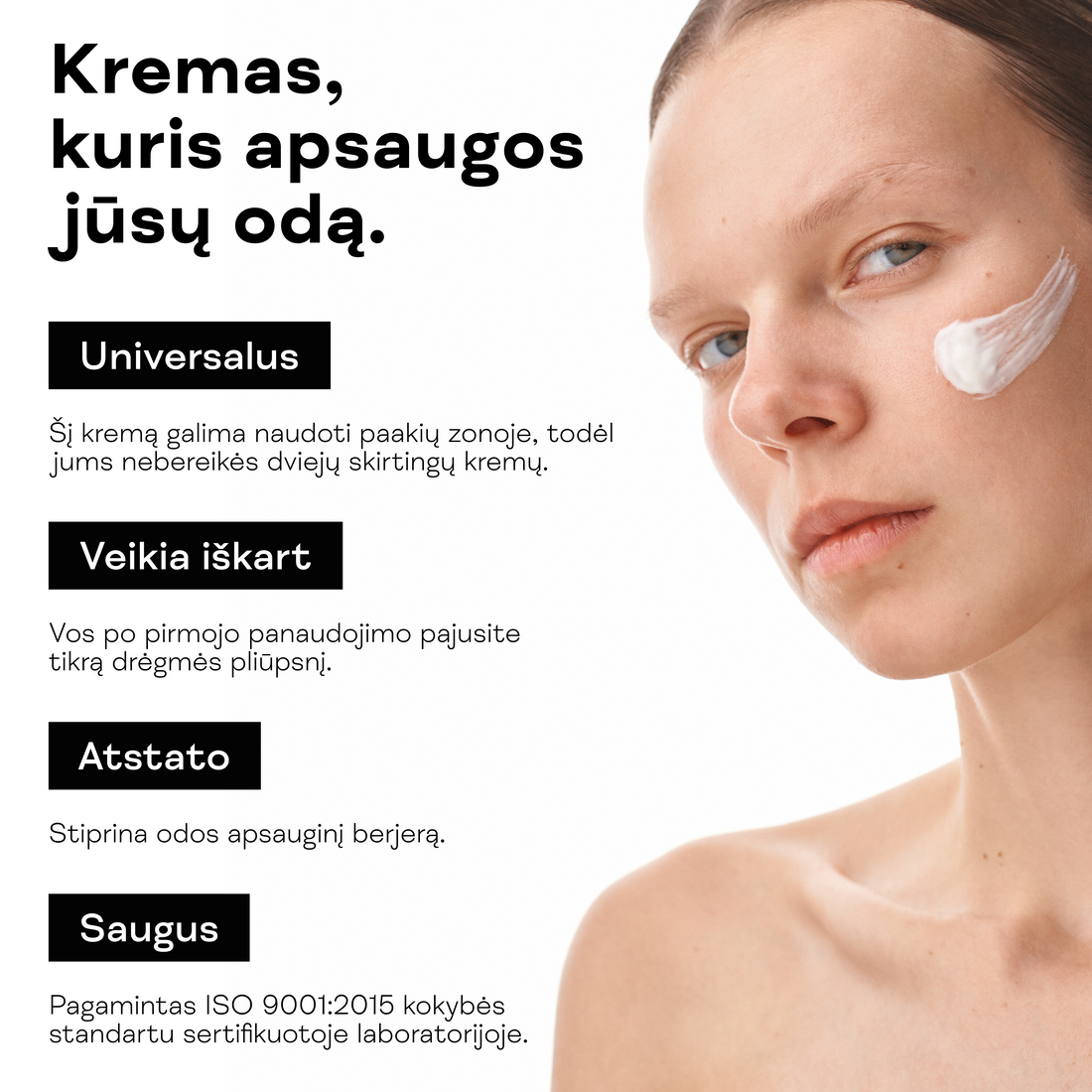 Maitinamojo veido kremo aplikavimas ant moters skruosto.